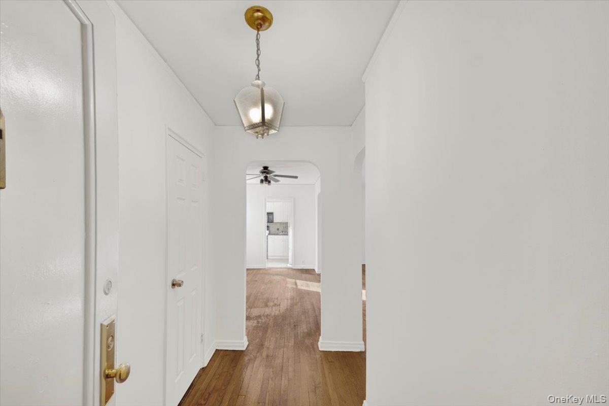 811 Bronx River Road, Unit 3C Bronxville, NY 10708 - Photo 19 of 27 a view of a hallway with wooden floor