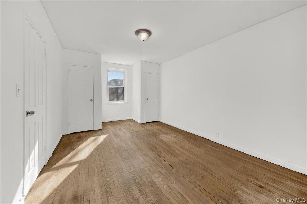 811 Bronx River Road, Unit 3C Bronxville, NY 10708 - Photo 23 of 27 a view of empty room with wooden floor