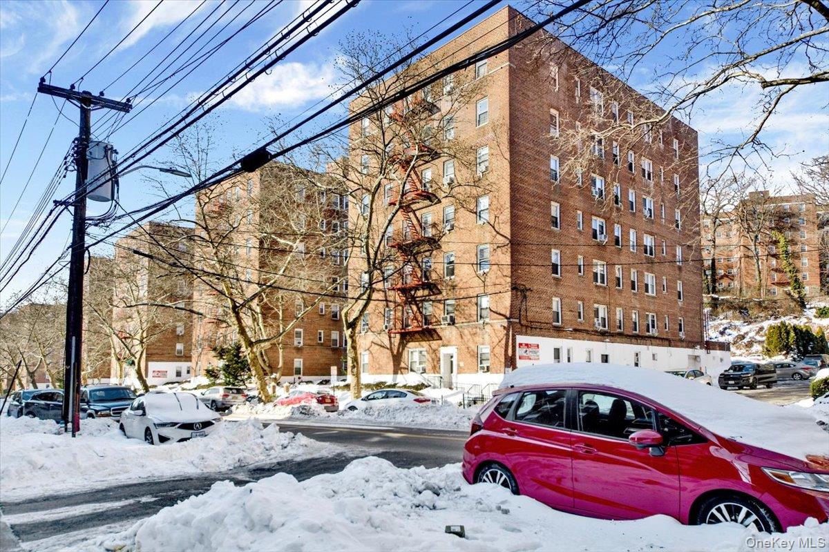 811 Bronx River Road, Unit 3C Bronxville, NY 10708 - Photo 25 of 27 a car parked in front of a building