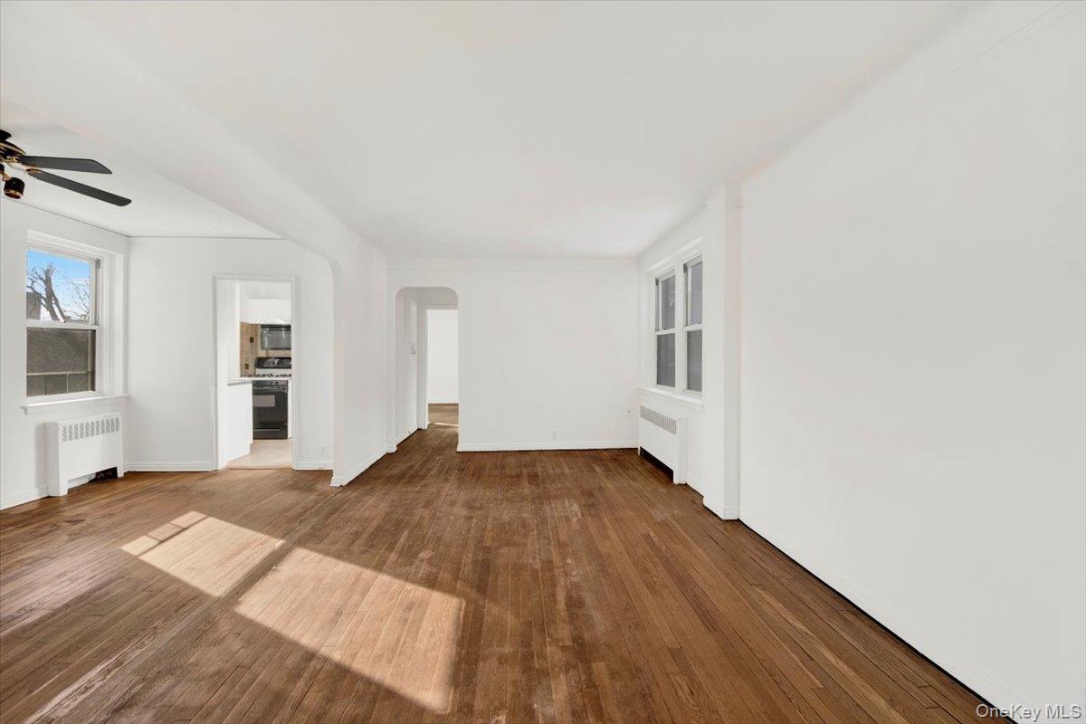 811 Bronx River Road, Unit 3C Bronxville, NY 10708 - Photo 10 of 27 a view of a bedroom with wooden floor and closet