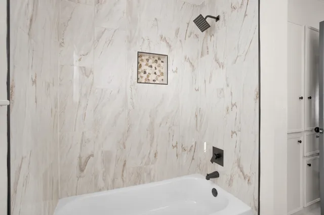 a bathroom with a bathtub