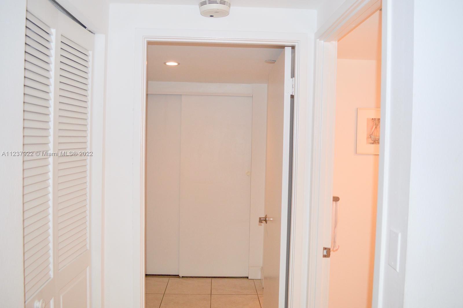 151 Crandon Boulevard, Unit 127 Key Biscayne, FL 33149 - Photo 18 of 30 a view of front door
