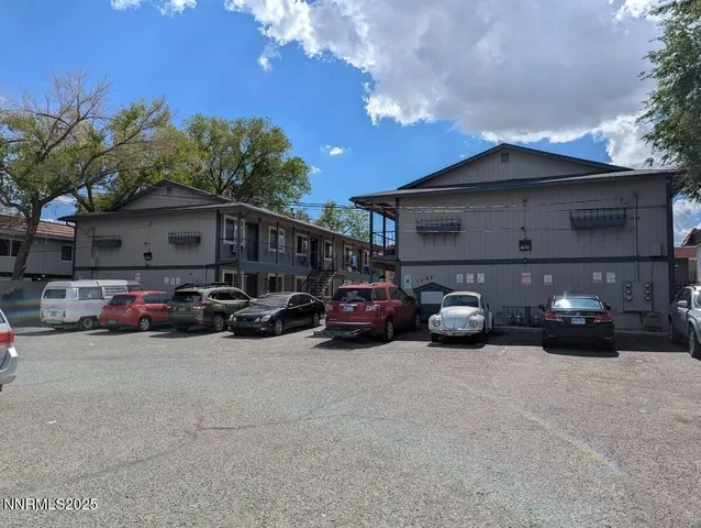 a view of a car in front of a house