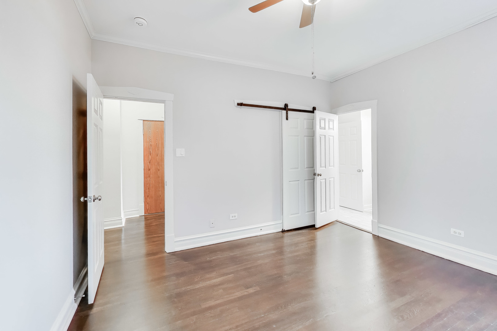 1447 West Warner Avenue, Unit 3W Chicago, IL 60613 - Photo 23 of 27 a view of a room with wooden floor