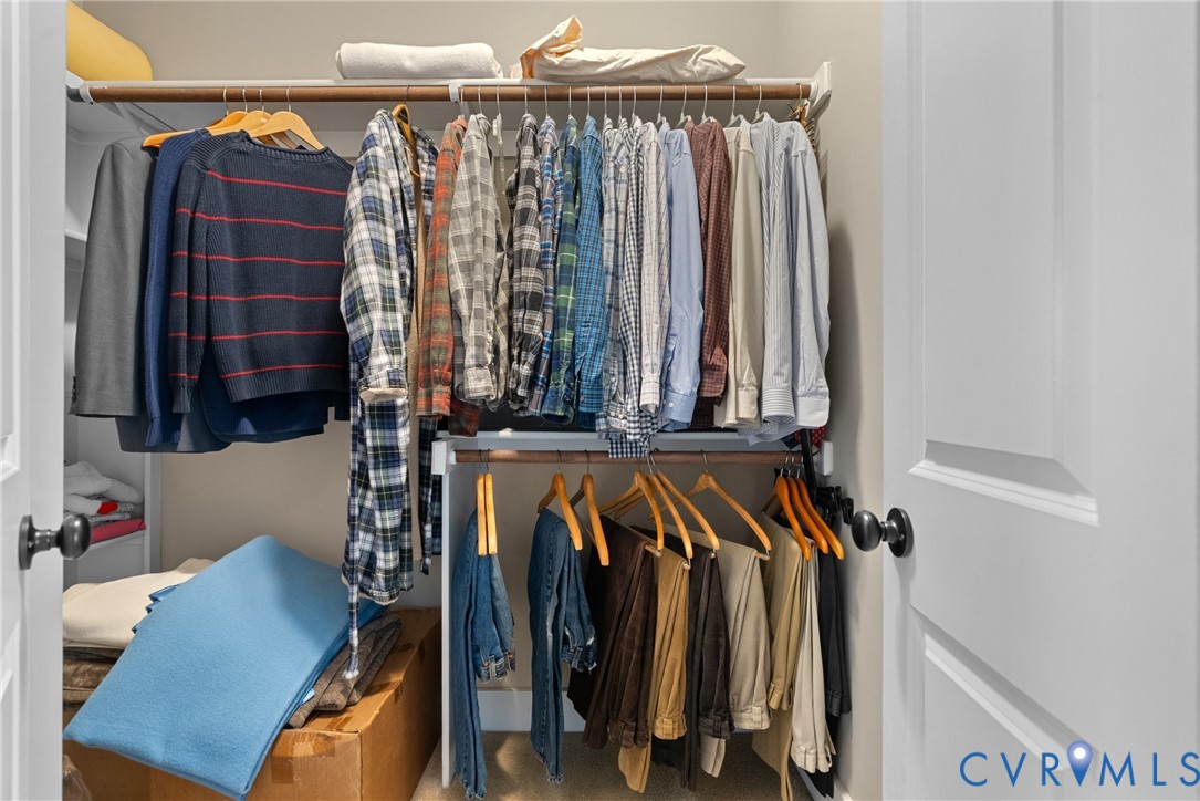 11630 Barrows Ridge Lane Chesterfield, VA 23838 - Photo 32 of 50 a view of walk in closet with clothes and shoes