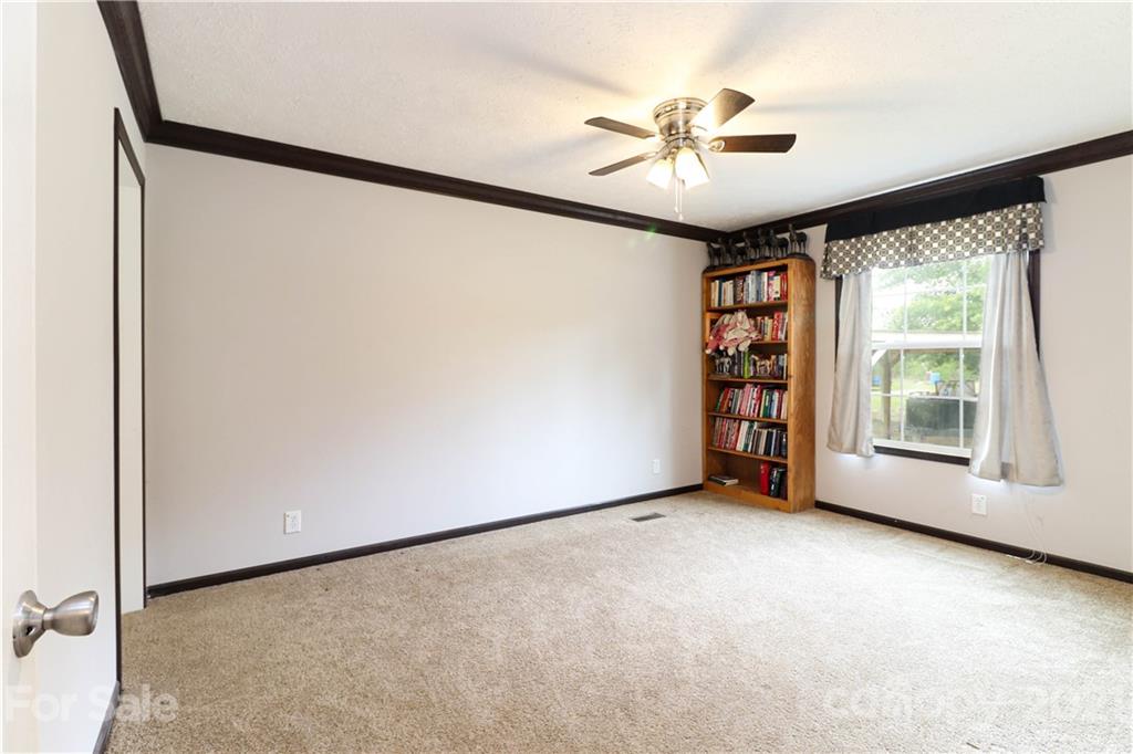 4024 Steen Road Mount Croghan, SC 29727 - Photo 24 of 37 an empty room with windows and fan