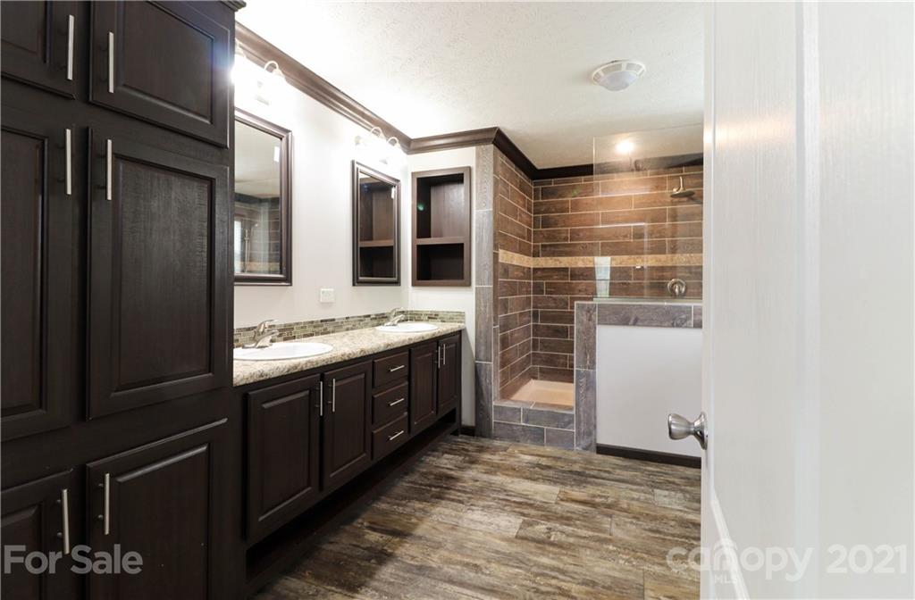 4024 Steen Road Mount Croghan, SC 29727 - Photo 8 of 37 a bathroom with a sink and a mirror