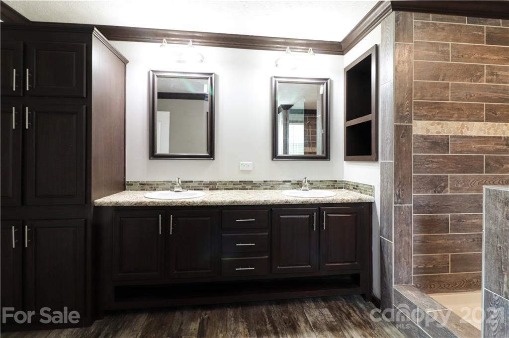 4024 Steen Road Mount Croghan, SC 29727 - Photo 9 of 37 a bathroom with a sink and a mirror