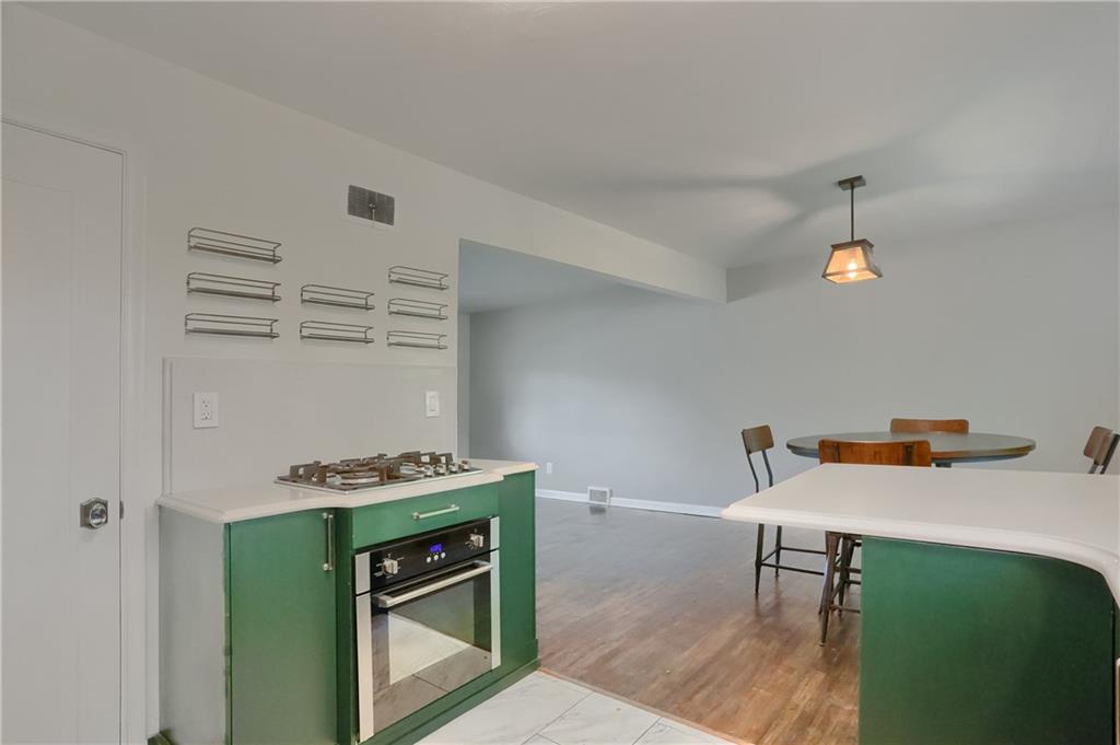 331 Hoffman Road Pittsburgh, PA 15212 - Photo 17 of 40 A gas stove top and built in oven are featured in the kitchen.