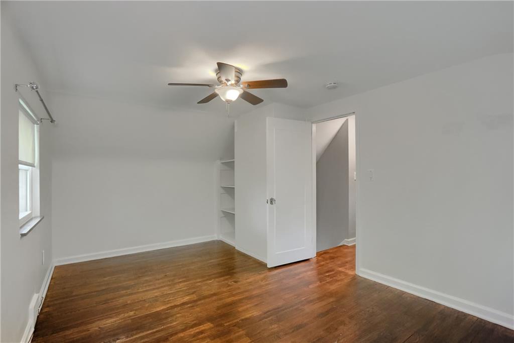 331 Hoffman Road Pittsburgh, PA 15212 - Photo 20 of 40 Built in shelving is featured in this guest bedroom.