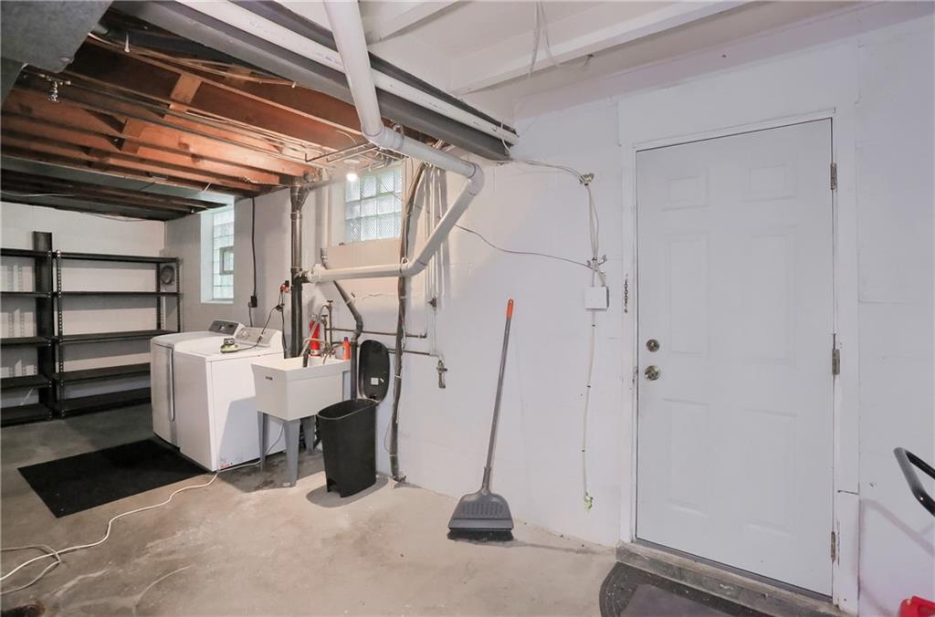 331 Hoffman Road Pittsburgh, PA 15212 - Photo 35 of 40 The walk-out lower level provides laundry access and the potential for added living space.
