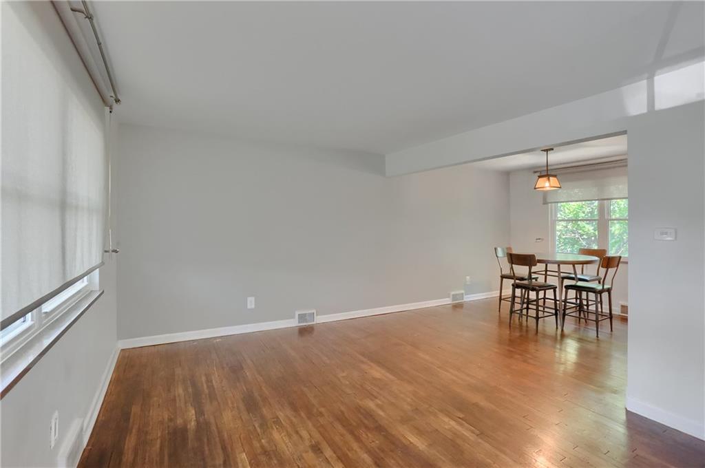 331 Hoffman Road Pittsburgh, PA 15212 - Photo 5 of 40 The family features a neutral tone and is open to the dining area.