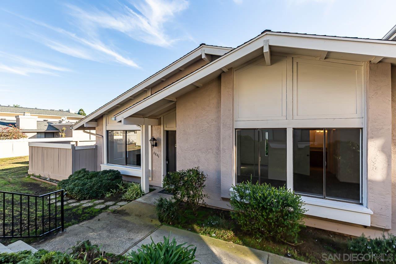 8046 Camino Tranquilo San Diego, CA 92122 - Photo 1 of 14 a front view of a house with plants