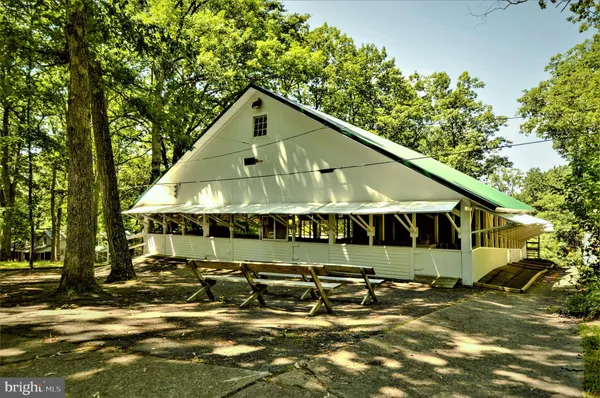 a view of a park with swings and slides