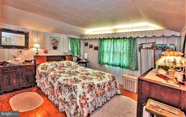 a bed room with a bed and a fish aquarium