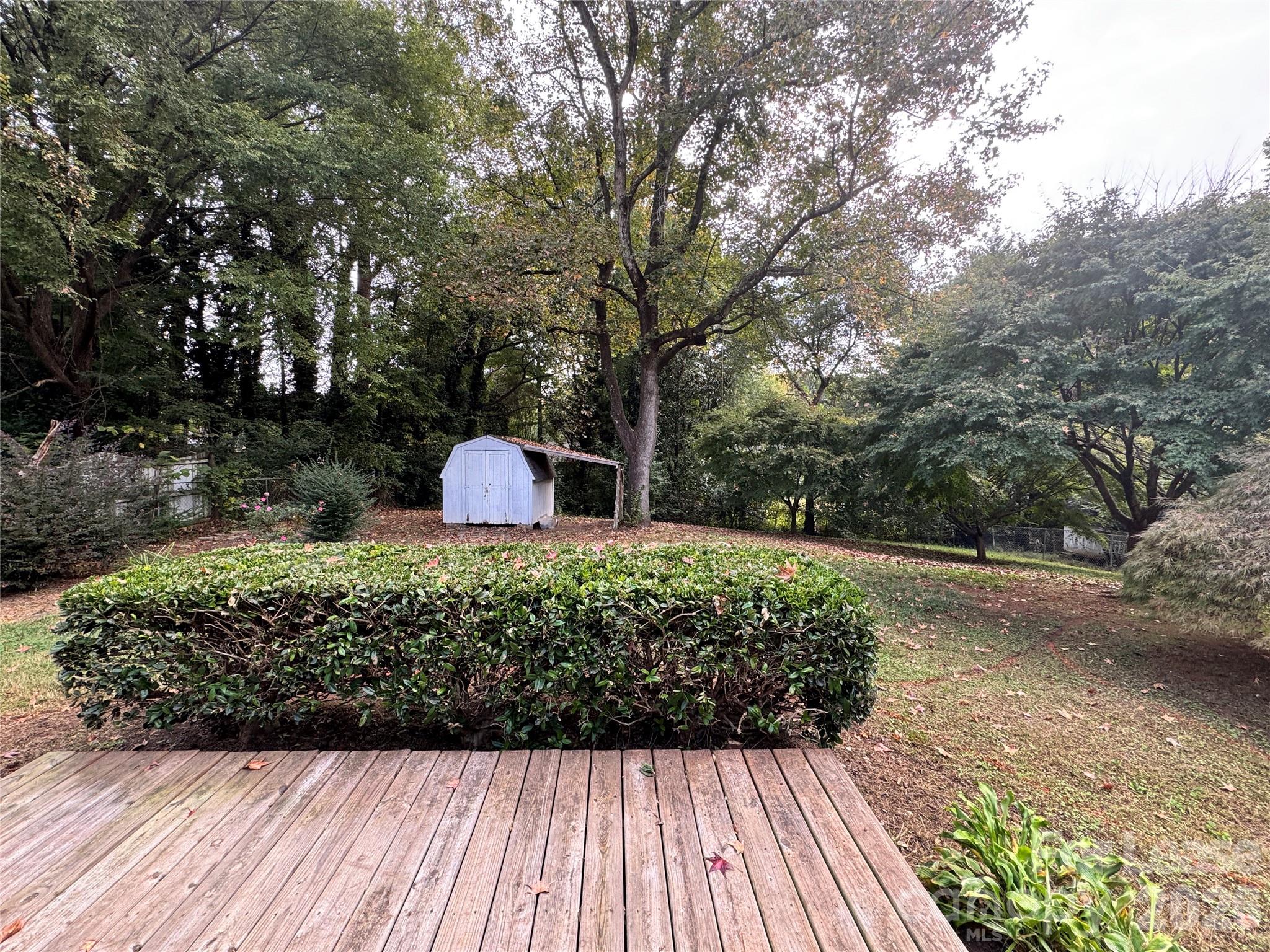 6314 Harrisburg Road Charlotte, NC 28227 - Photo 16 of 16 a view of a garden with pathway