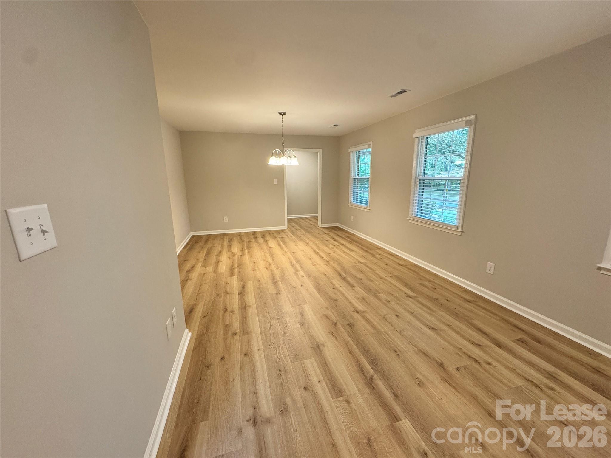 6314 Harrisburg Road Charlotte, NC 28227 - Photo 10 of 16 a view of an empty room and window