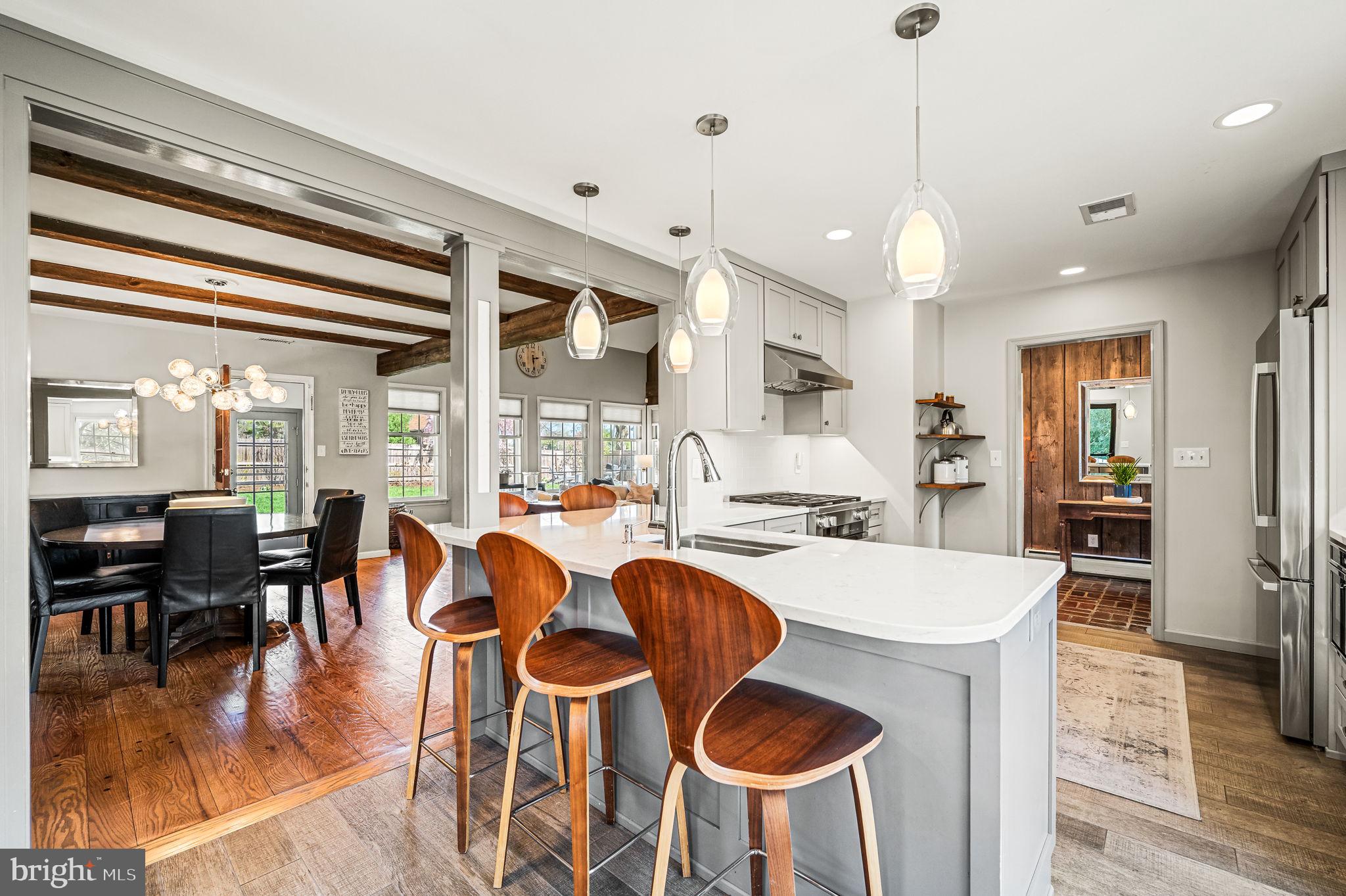 124 South Providence Road Wallingford, PA 19086 - Photo 13 of 53 a large kitchen with a table and chairs