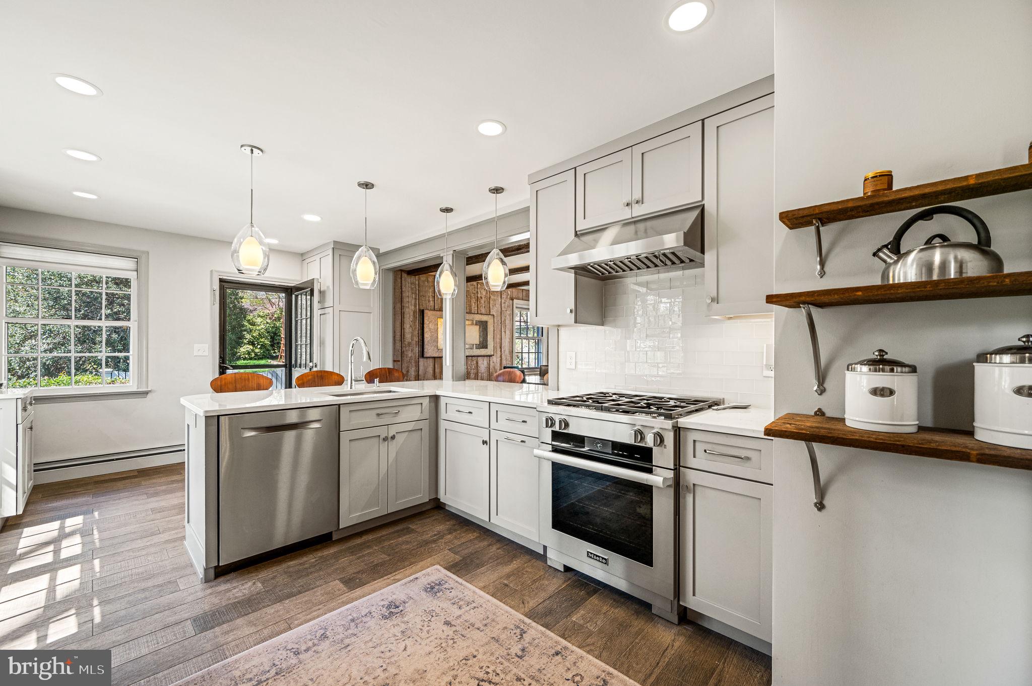 124 South Providence Road Wallingford, PA 19086 - Photo 14 of 53 a kitchen with a stove and a sink