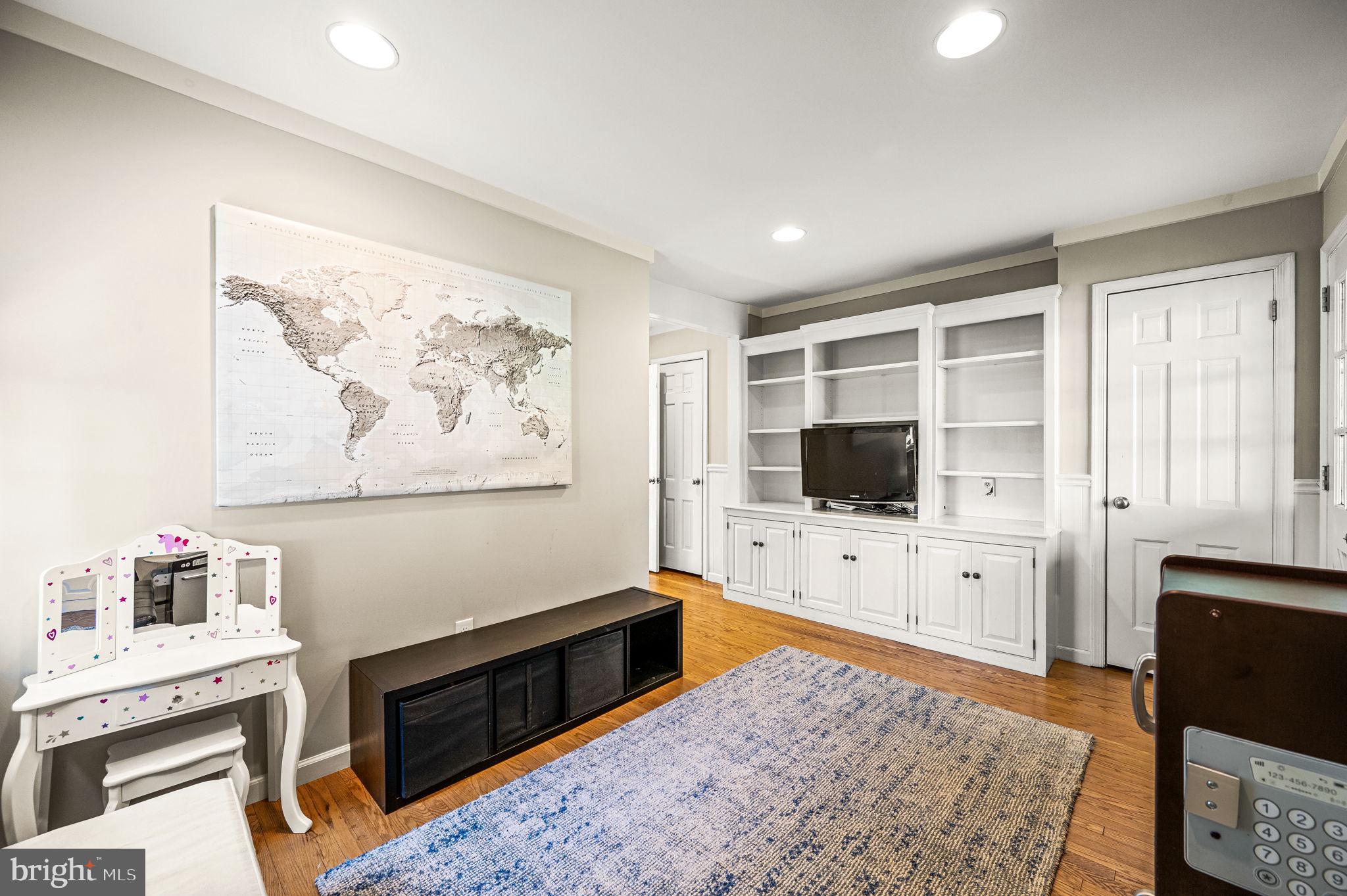 124 South Providence Road Wallingford, PA 19086 - Photo 17 of 53 a living room with furniture and a flat screen tv