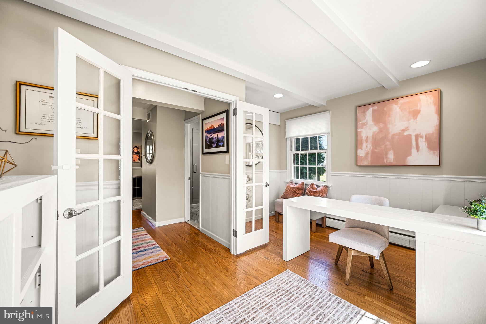 124 South Providence Road Wallingford, PA 19086 - Photo 18 of 53 a spacious bedroom with a bed and a table
