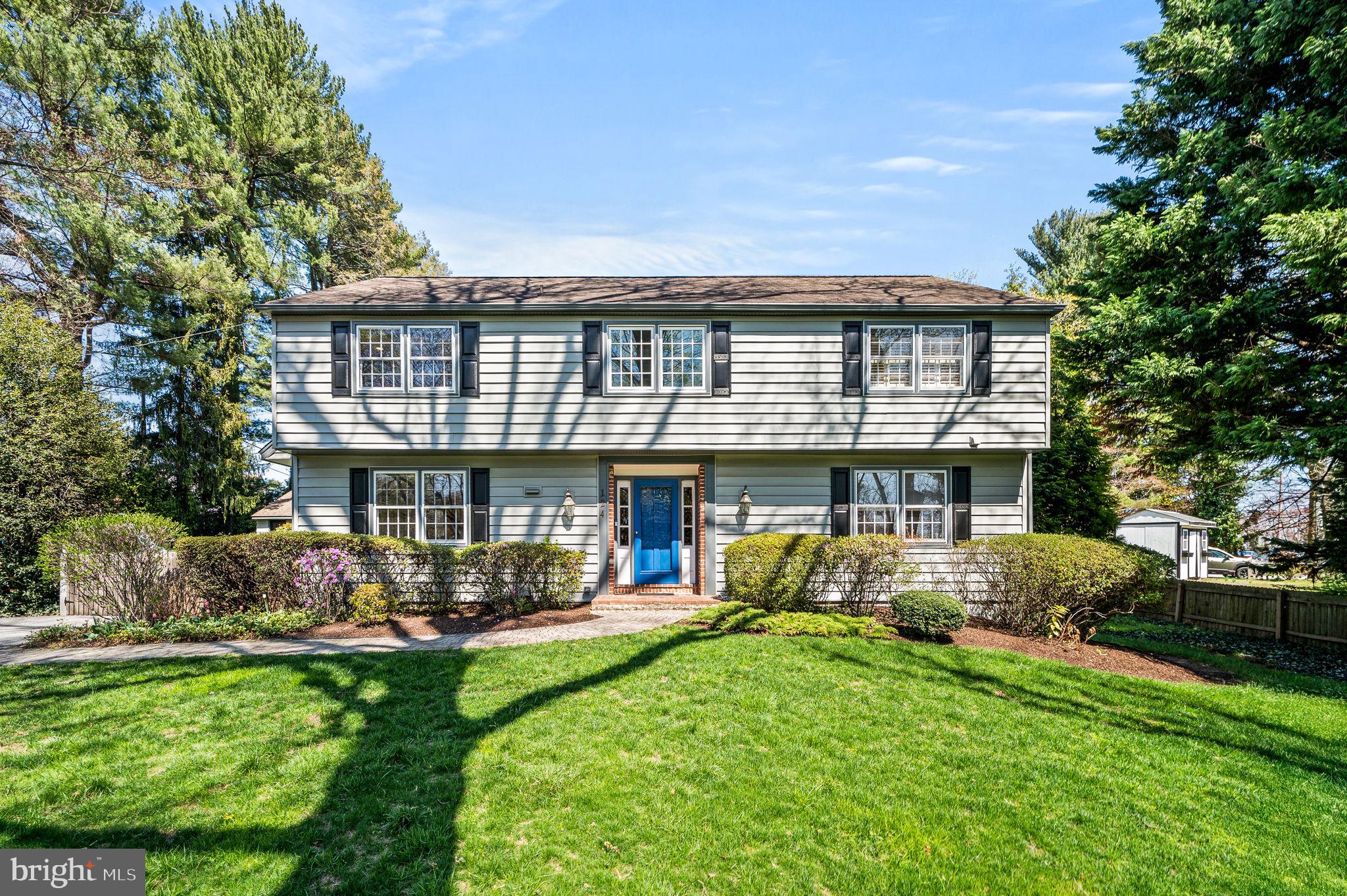 124 South Providence Road Wallingford, PA 19086 - Photo 2 of 53 a front view of a house with garden