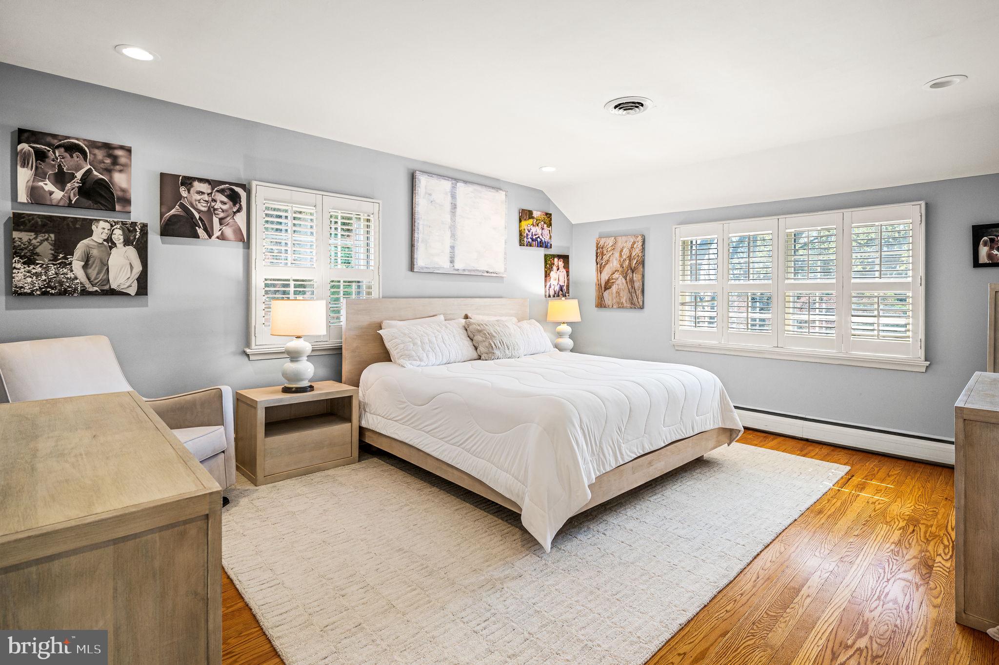 124 South Providence Road Wallingford, PA 19086 - Photo 24 of 53 a bedroom with a large bed and a couch