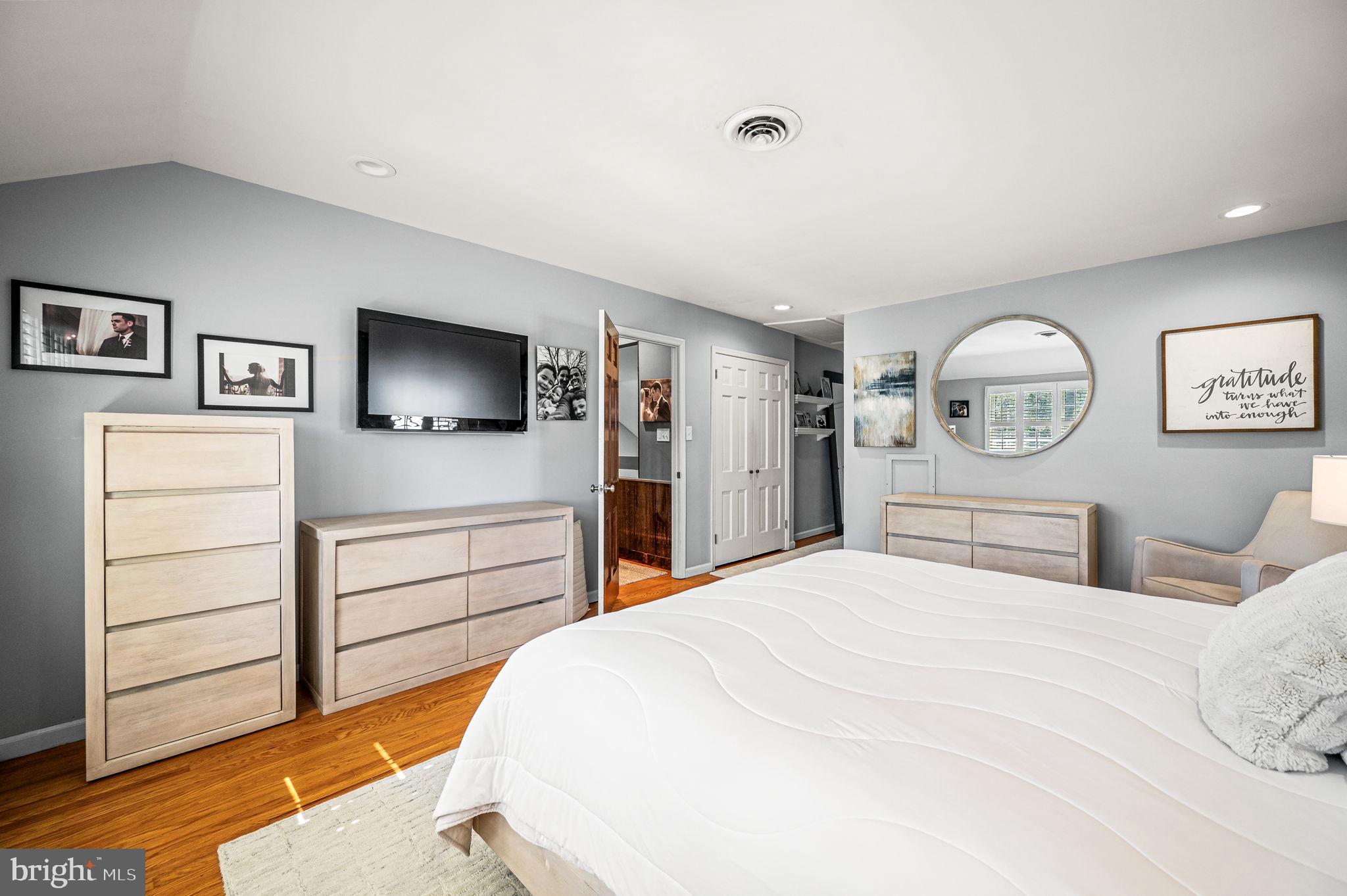 124 South Providence Road Wallingford, PA 19086 - Photo 25 of 53 a bedroom with a bed and a flat screen tv