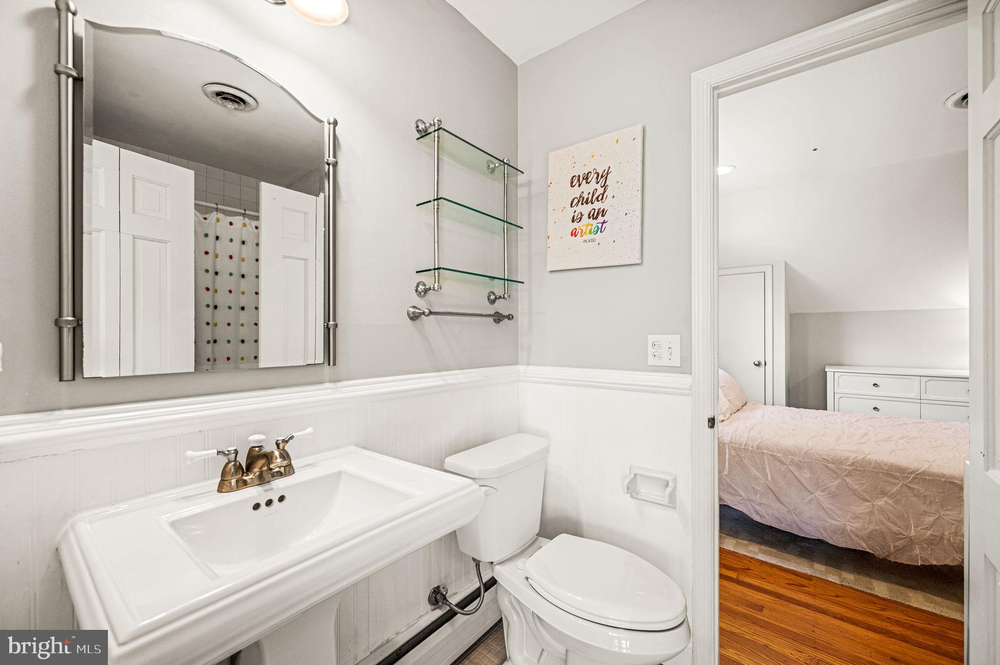 124 South Providence Road Wallingford, PA 19086 - Photo 30 of 53 a bathroom with a sink a toilet and shower