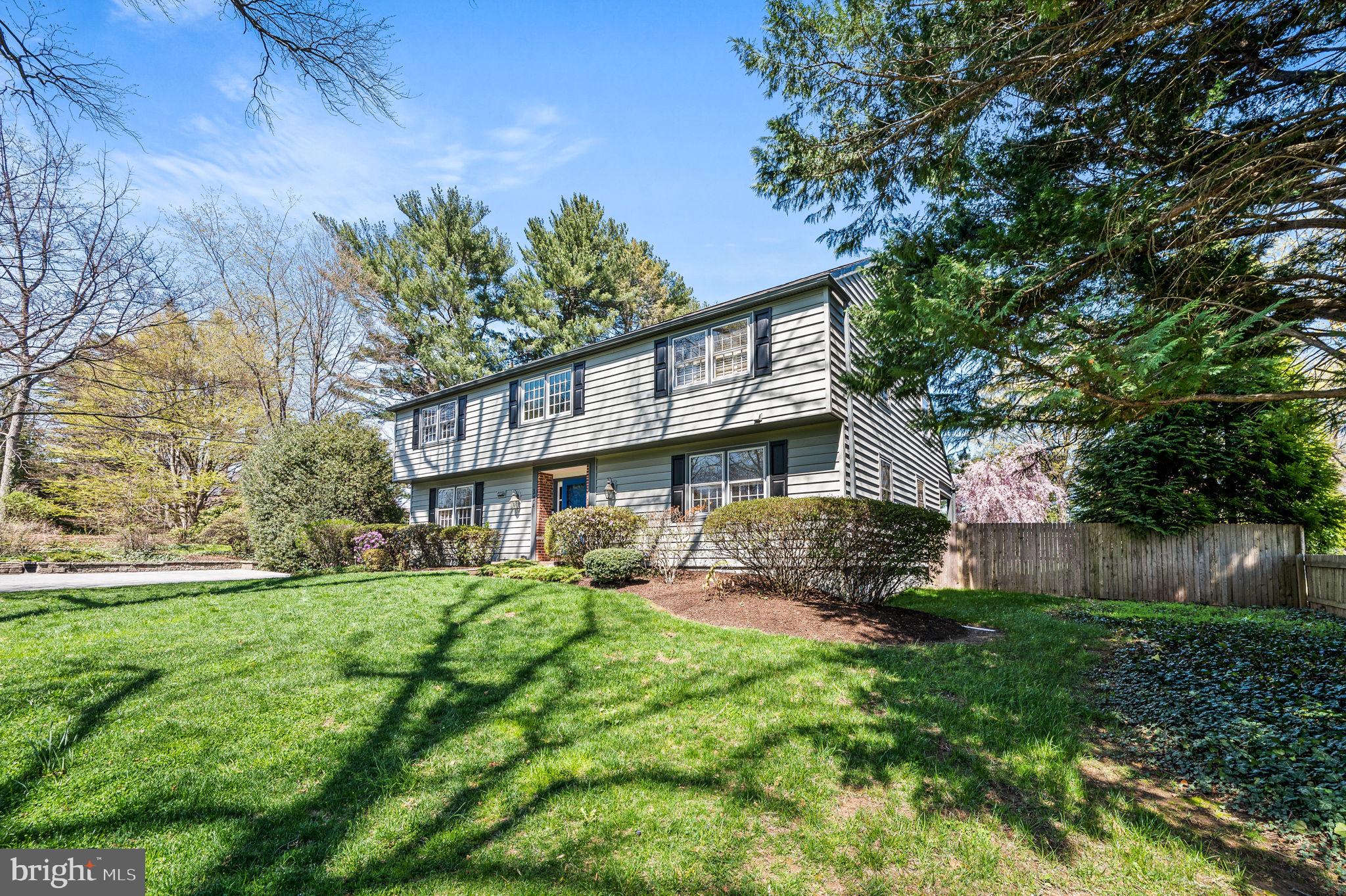 124 South Providence Road Wallingford, PA 19086 - Photo 3 of 53 a front view of a house with garden