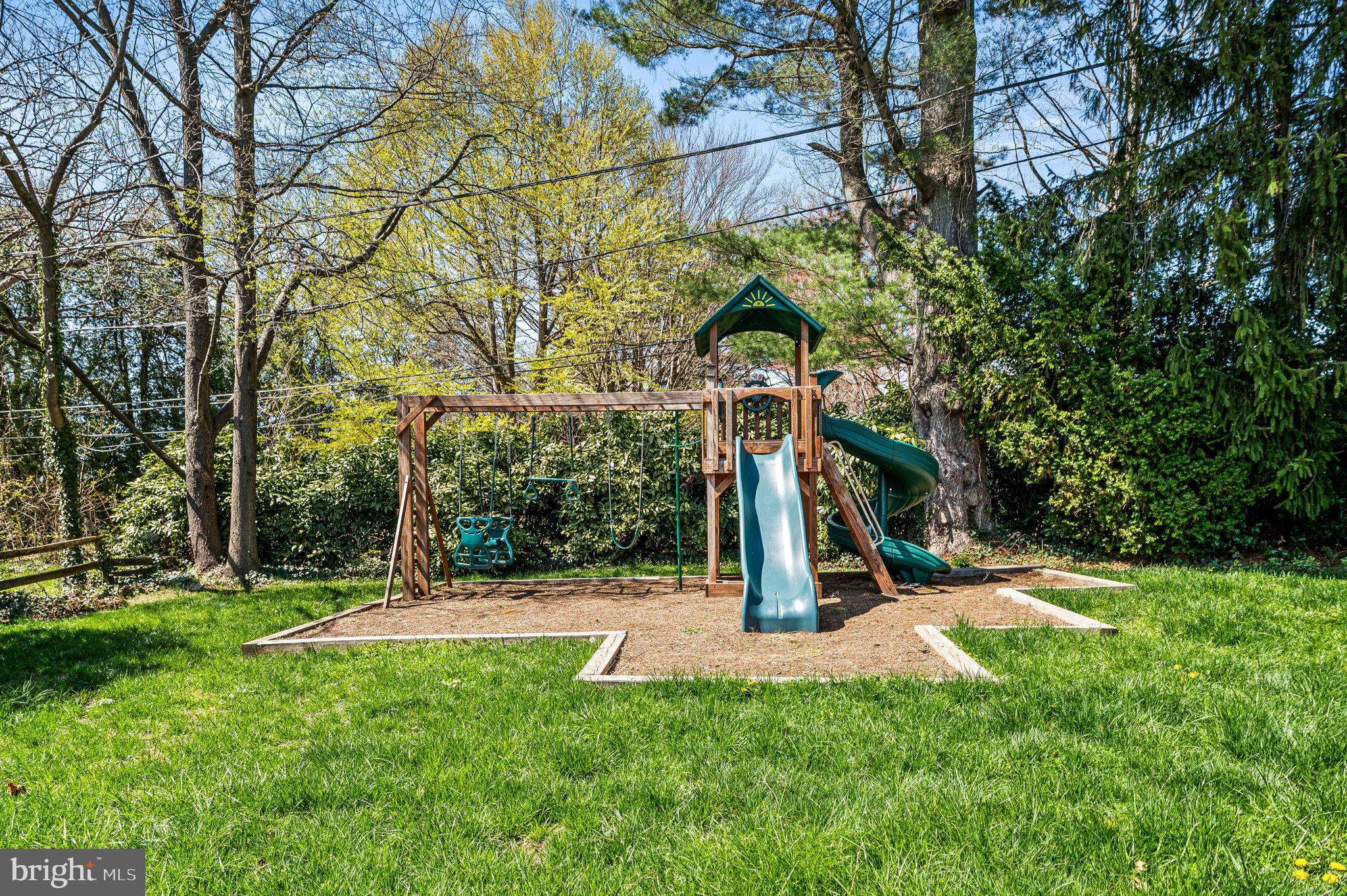 124 South Providence Road Wallingford, PA 19086 - Photo 40 of 53 a view of a park with swings