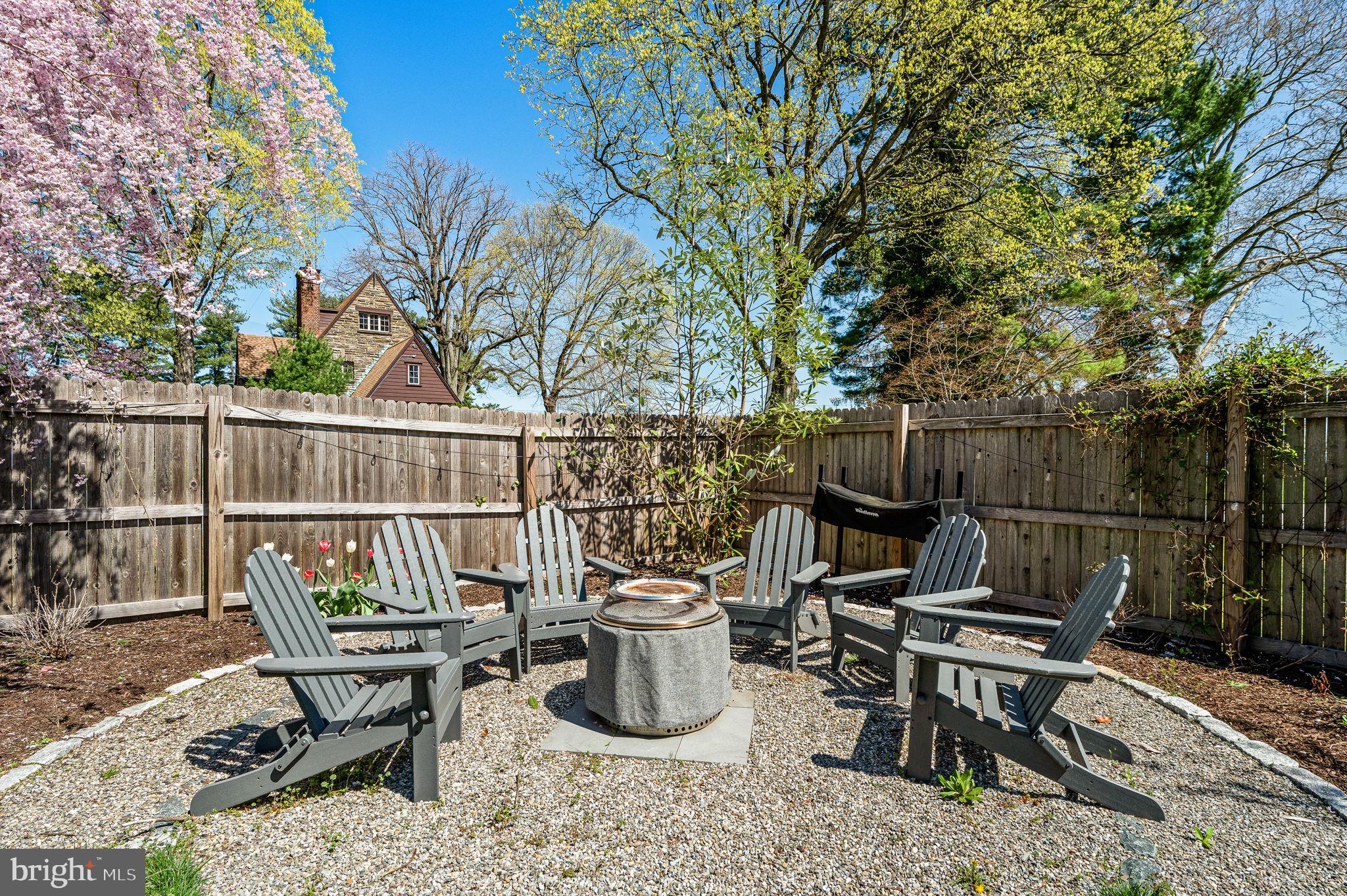 124 South Providence Road Wallingford, PA 19086 - Photo 45 of 53 a view of a chairs and table in the back yard