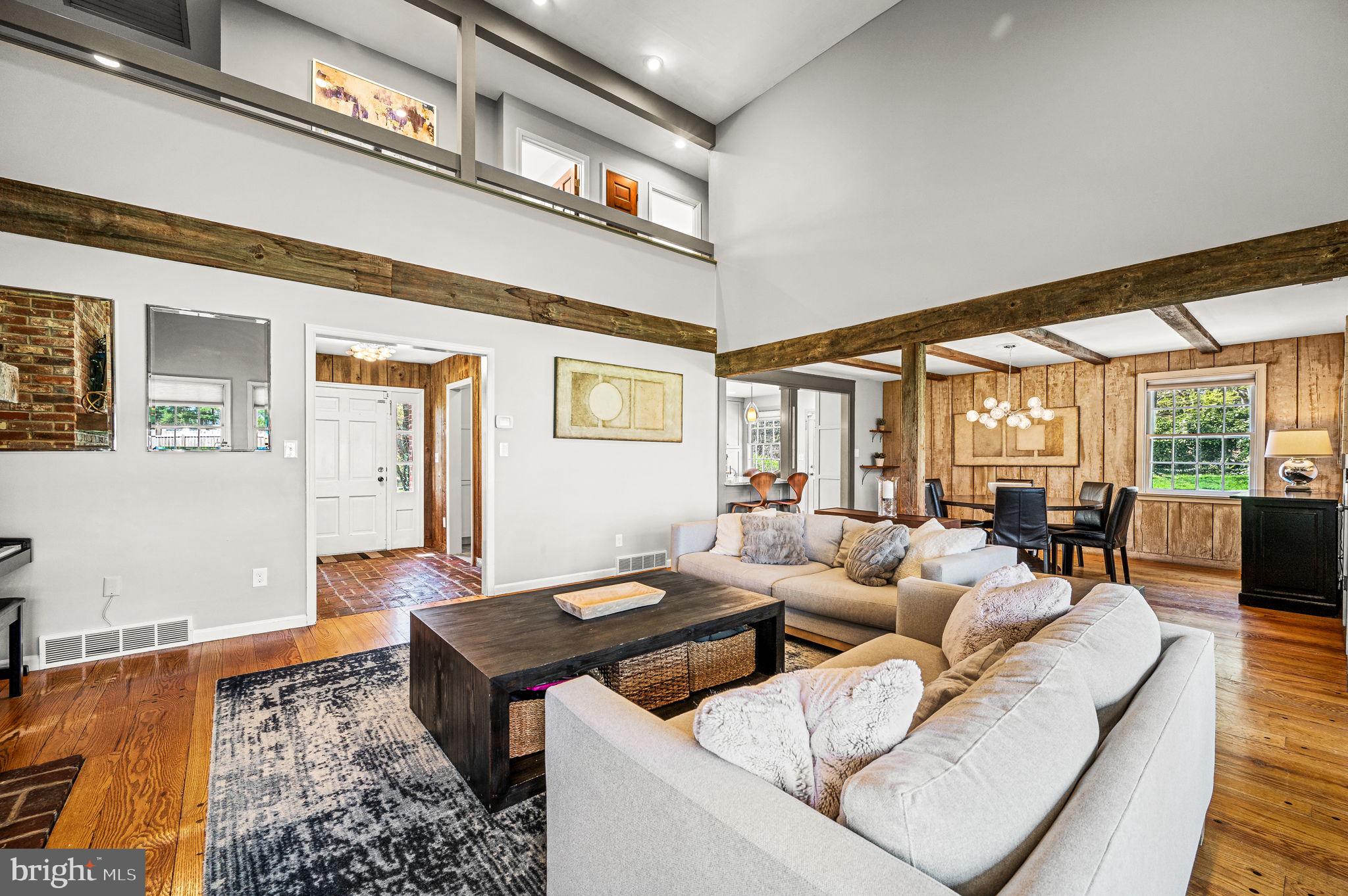 124 South Providence Road Wallingford, PA 19086 - Photo 9 of 53 a living room with furniture and a large window