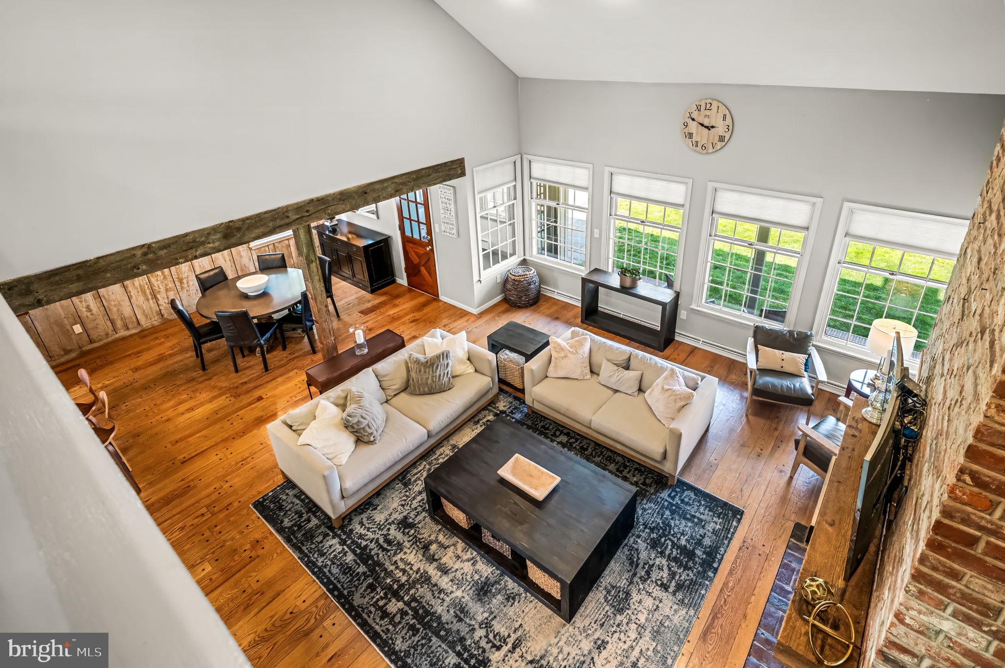 124 South Providence Road Wallingford, PA 19086 - Photo 10 of 53 a living room with furniture and a rug
