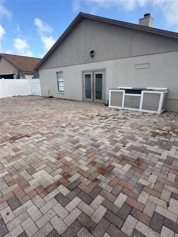 a big room with yard and a large window