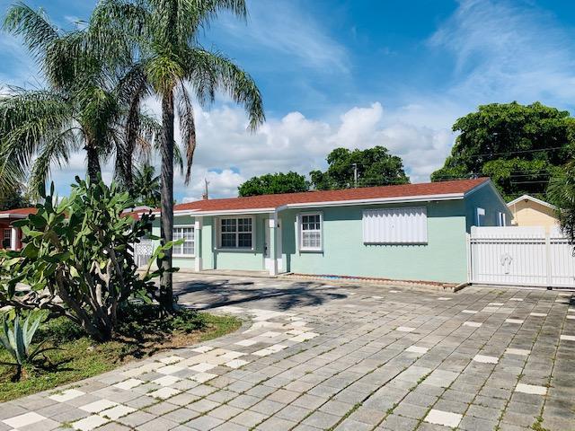 3073 Frost Road Palm Springs, FL 33406 - Photo 1 of 6 front