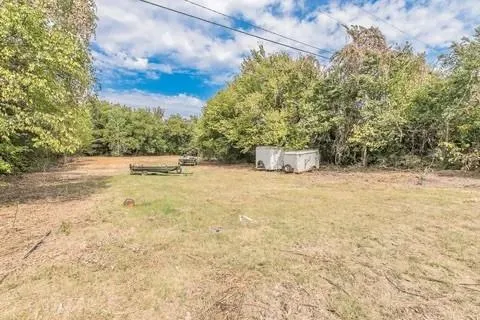 a view of an outdoor space and a yard