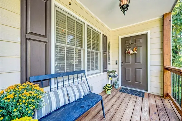 a view of a porch with wooden floor
