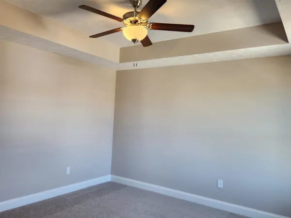 a view of a small space with a fan