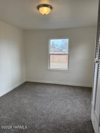 an empty room with a window