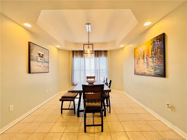 a view of a dining room with furniture