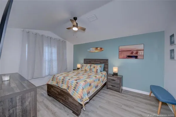 a living room with couch and a window