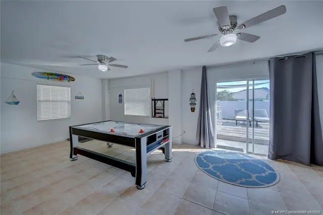 a view of a livingroom with furniture and a chandelier