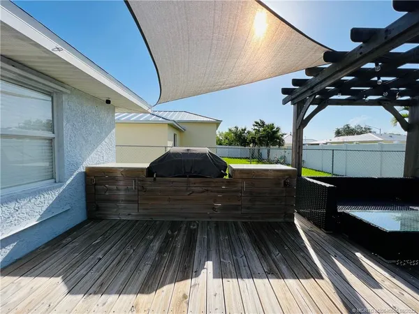 an aerial view of a city with ocean view