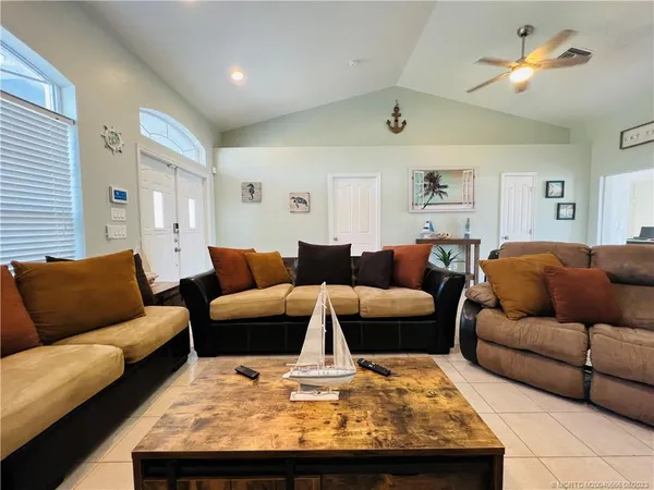 a living room with furniture and a couch