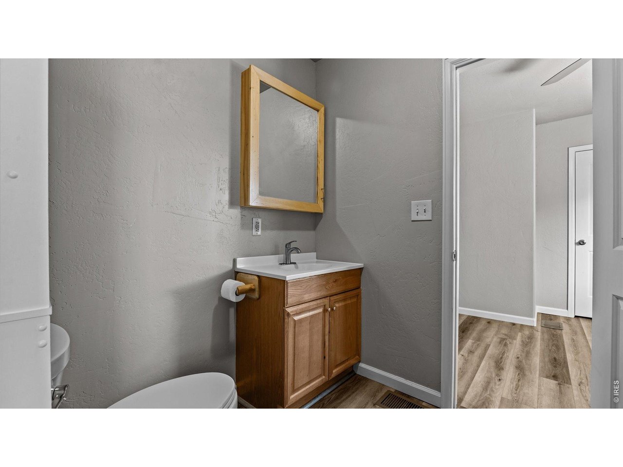 632 Minter Avenue De Beque, CO 81630 - Photo 14 of 26 a bathroom with a sink and a mirror
