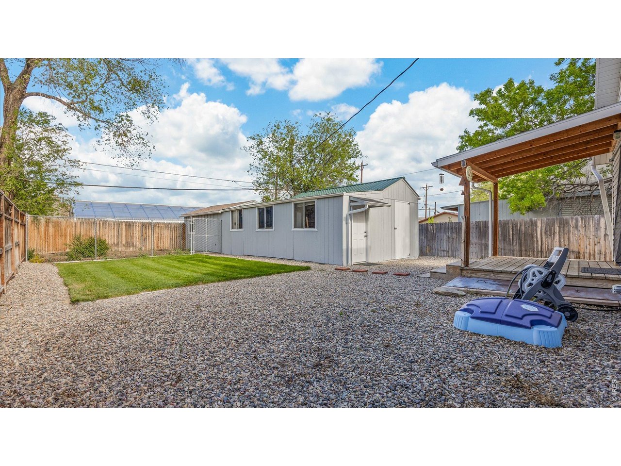 632 Minter Avenue De Beque, CO 81630 - Photo 19 of 26 a backyard of a house with table and chairs