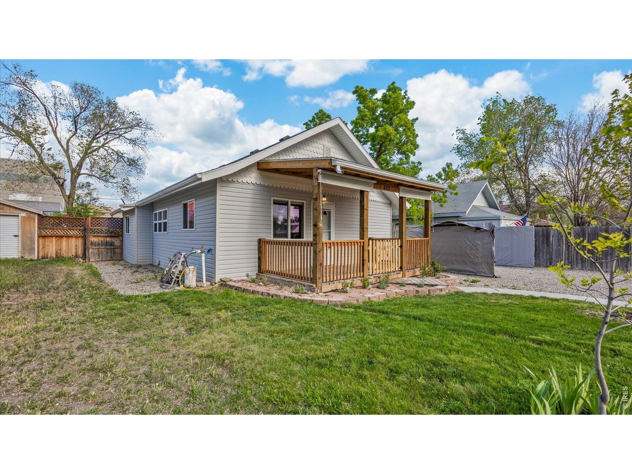 632 Minter Avenue De Beque, CO 81630 - Photo 2 of 26 a view of a backyard with a garden and plants