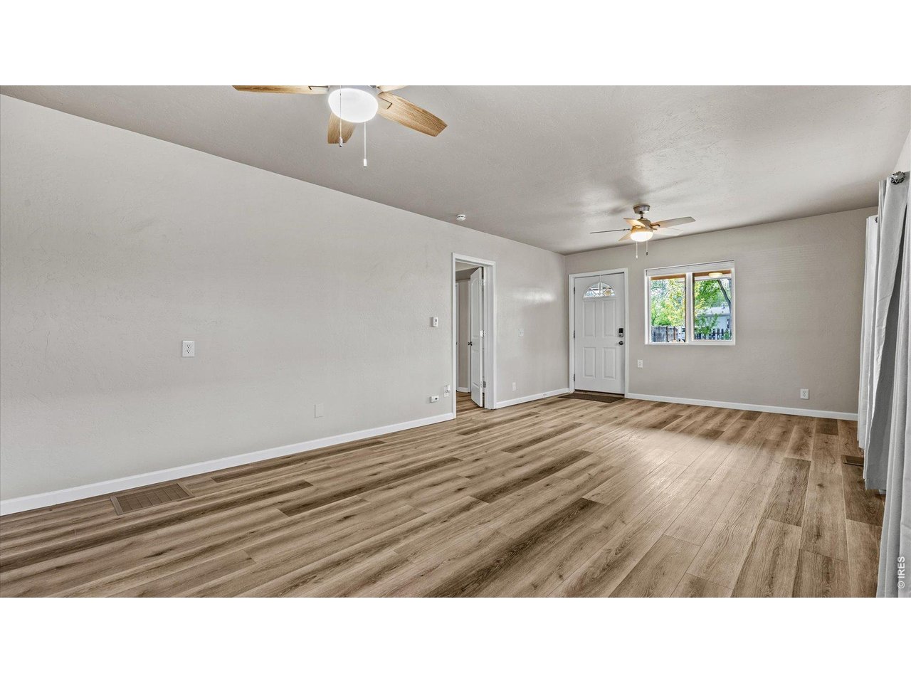 632 Minter Avenue De Beque, CO 81630 - Photo 6 of 26 a black and white photo of a room