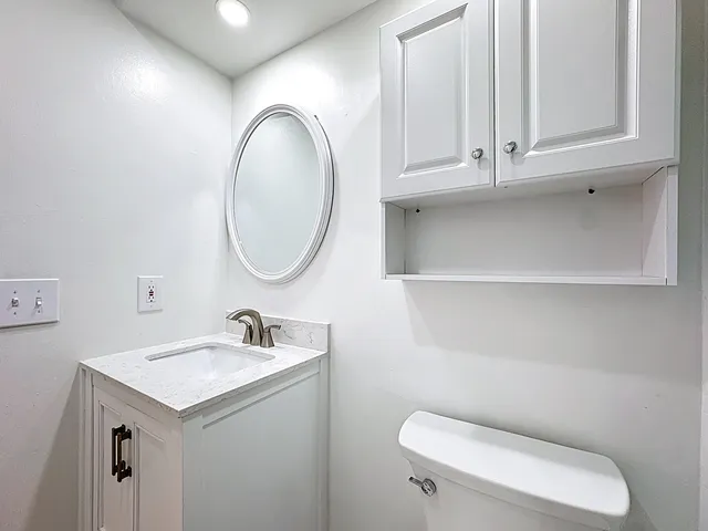 a bedroom with bed and window